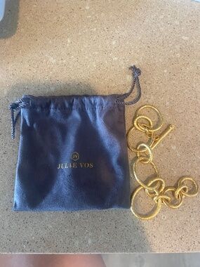 Julie Vos gold tone bracelet interloching assymetrical circles with clasp